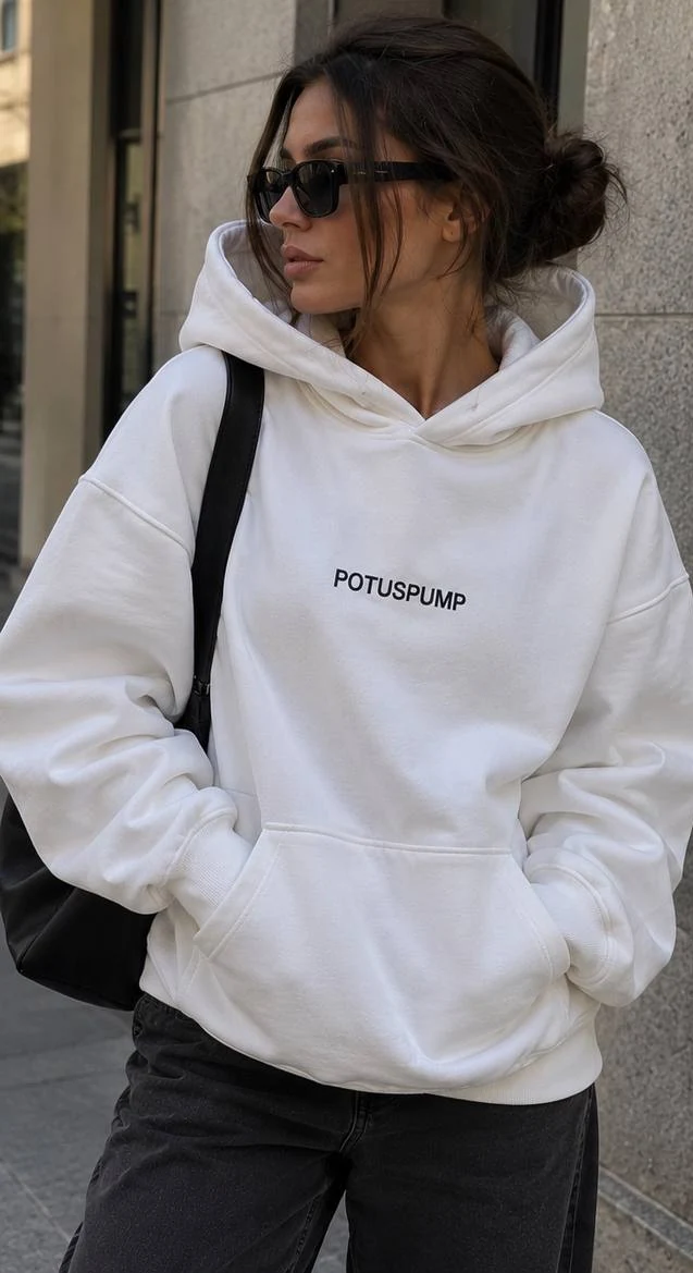 Essential White Hoodie worn in an everyday look